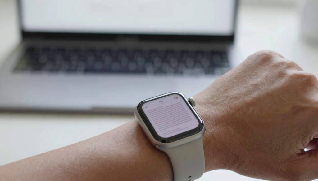 Apple Watch on a wrist showing a PDF document page, illustrating that watchOS has no built-in PDF viewer