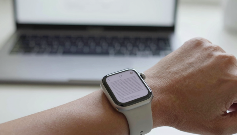 Apple Watch on a wrist showing a PDF document page, illustrating that watchOS has no built-in PDF viewer